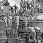 Commandos from No.2 loading ammunition on board LCA
