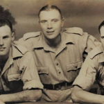 Pte Ronald Voller (centre) and others