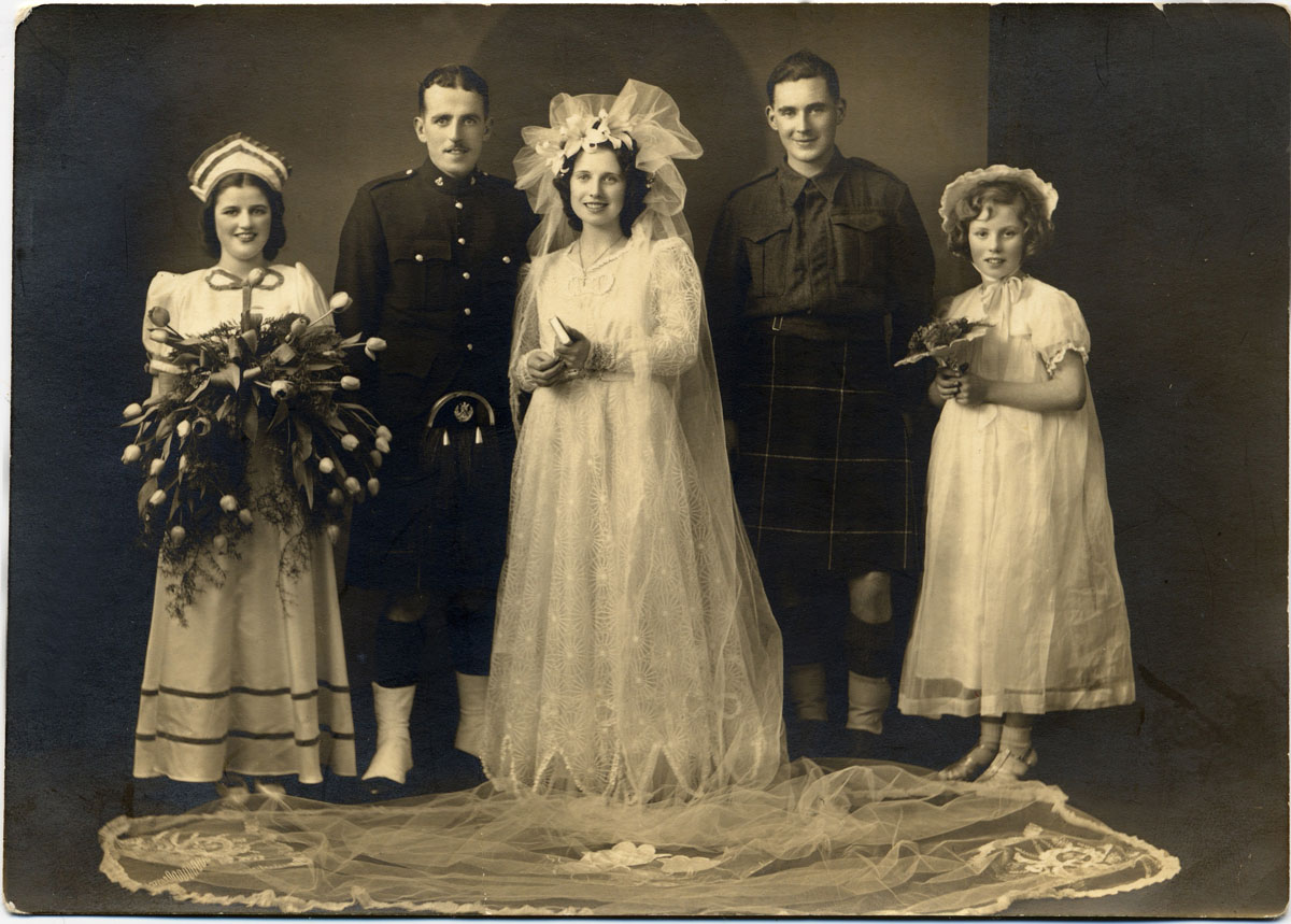 Les Wheelan (No.2 Cdo), his wife Molly, and his best man Joe Rogers (No.2 Cdo)