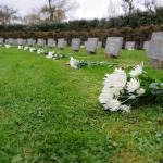 Flowers on the graves of the civilians who died