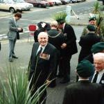 Henry Brown MBE in the centre, Bill Millin with bagpipes,  and others