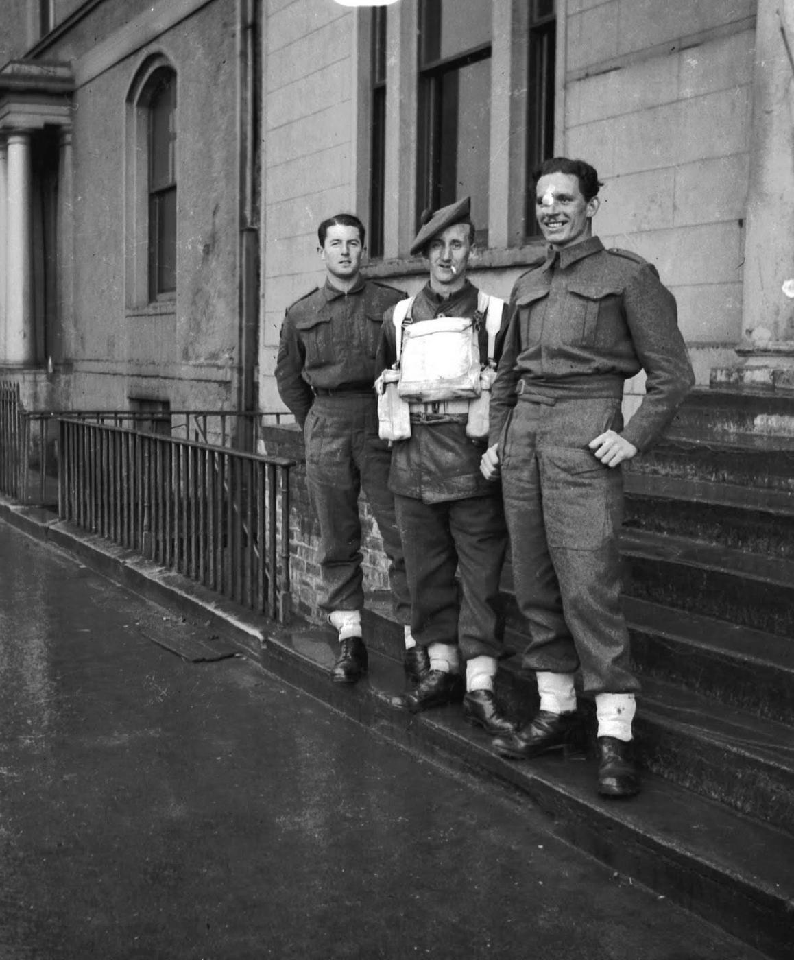 No.2 Commando Sgt. Ken McAllister on the left and 2 n/k