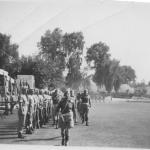 Raiding Forces Signal Squadron marches past the C in C ME