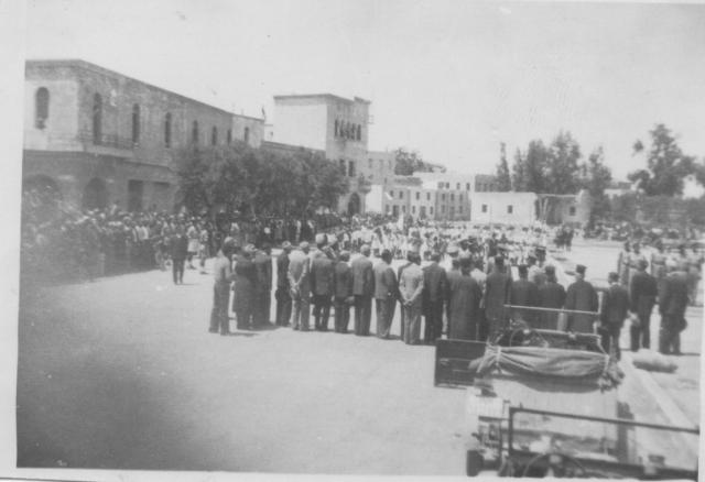 Church parade on quay at Cos in honour of 5 parachutists killed in raid on sept 44