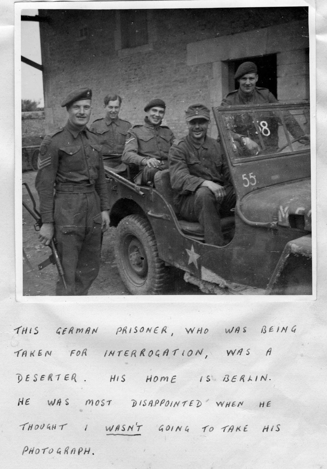 German deserter/prisoner being taken for interrogation