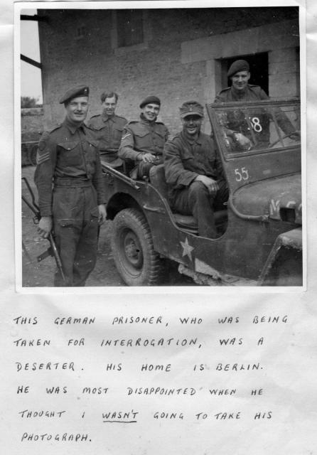 German deserter/prisoner being taken for interrogation