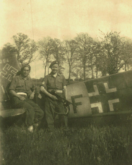 Sgt Kirby and Eric Taylor (sitting on the tail) , 'S' troop.