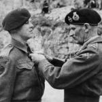 Marine Thomas Vardy 46RM Commando receiving his Military Medal from Montgomery