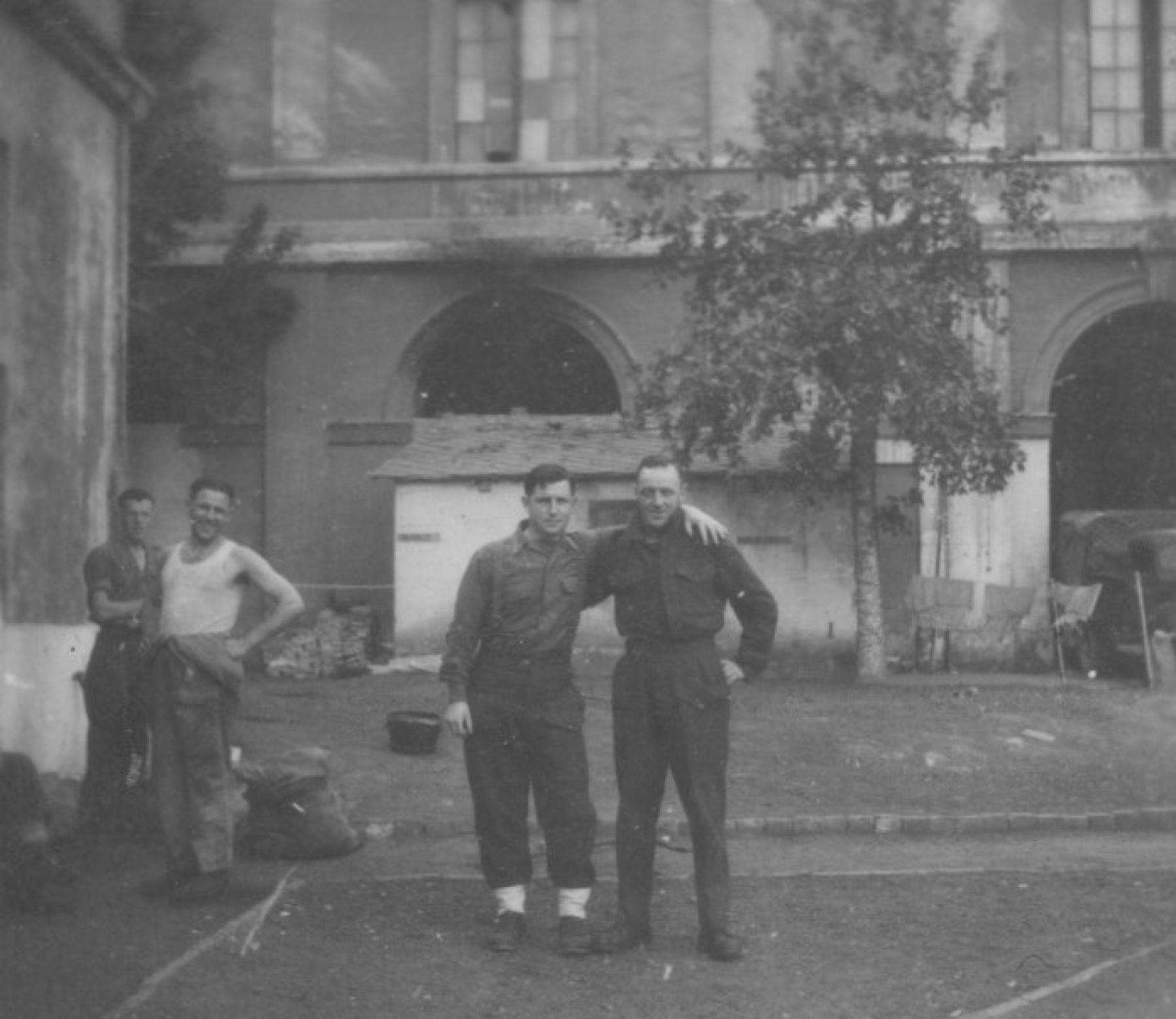 Sgt. Bill 'Chalky' White (No.2 Cdo. HQ troop) 2nd from right and others