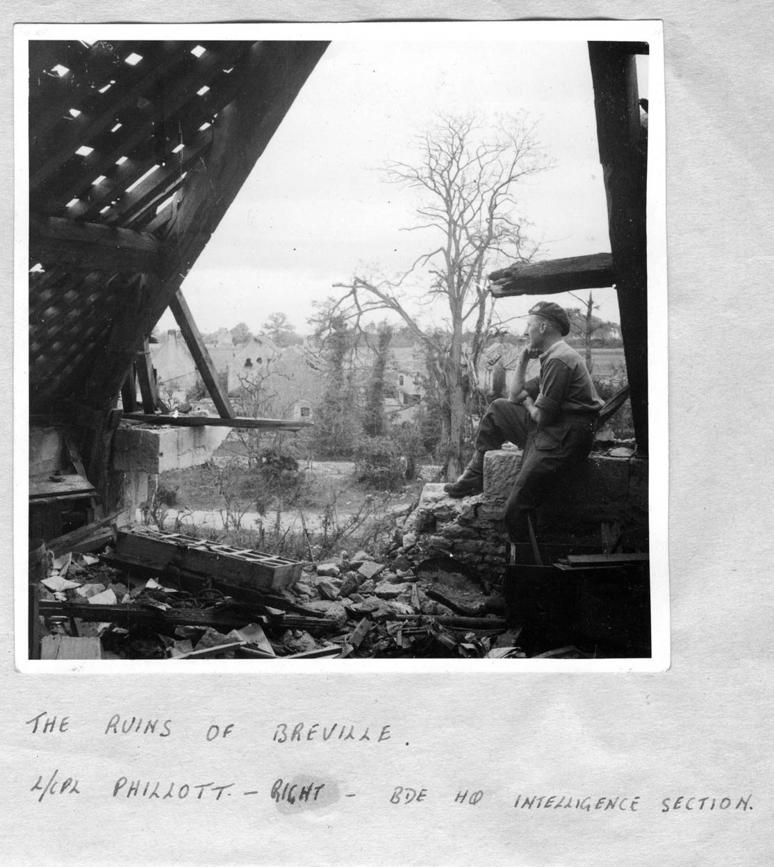 L/Cpl. Phillott , No.1  SS Bde. HQ Intelligence section amidst the ruins of Breville