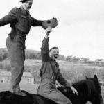 Wally Reynolds & Cpl Albert Reuben 'Don' Donohue, doing a rodeo act, Lamlash 1940