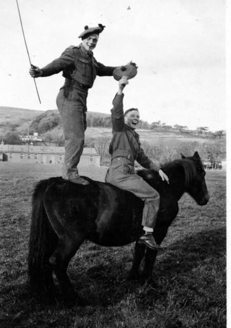 Wally Reynolds & Cpl Albert Reuben 'Don' Donohue, doing a rodeo act, Lamlash 1940
