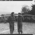 Lt. Col. C.E. Vaughan, Commandant, confers with his 2 i/c, Major Cockcraft, 12 Feb. 1943