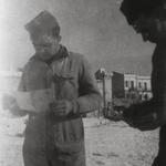 Marine James Nevin, 43RM Commando, reading a letter