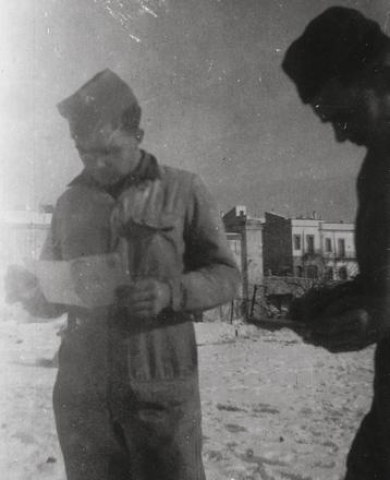 Marine James Nevin, 43RM Commando, reading a letter