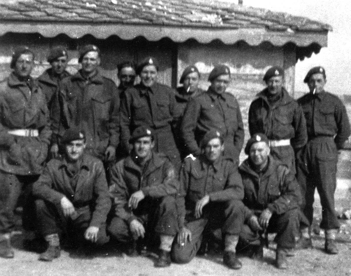 Mne. James Nevin (standing 3rd from right) and others. 43RM Commando.