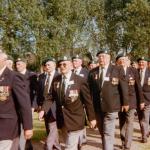 Veterans marching to the 45RM Cdo memorial cross in Le Plein 6th June 1997