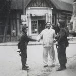 Capt. Porteous VC and McIver being greeted in Ouistreham