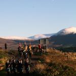 Lochaber High School Pipers lead the march to the Memorial at Spean Bridge