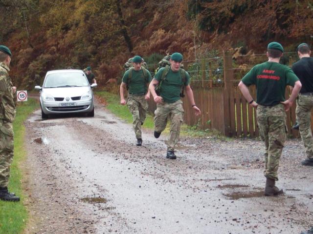Army Commandos complete the speed march from Spean Bridge Station to Achnacarry Castle