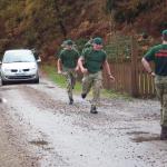 Army Commandos complete the speed march from Spean Bridge Station to Achnacarry Castle