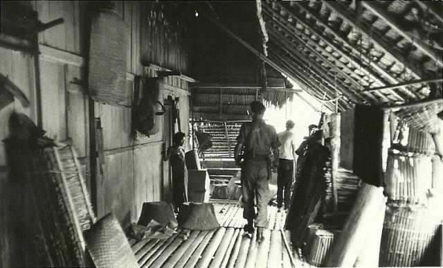 OFP Sarawak 1965  -  “Visiting” Longhouse Village(c).