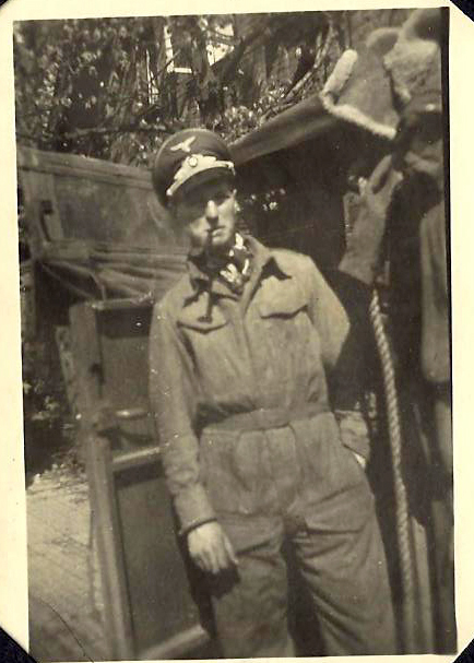Mne. Charles Booth, 46RM Commando, wearing a German hat