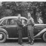 Pte John.Gallacher, unknown, and the CO's car. Salonika 1944.