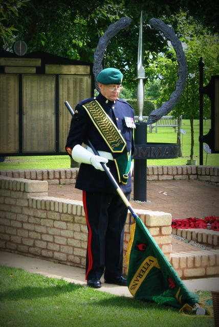 Fred Davies lowers the Association Standard