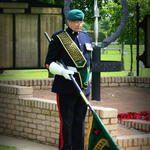 Fred Davies lowers the Association Standard