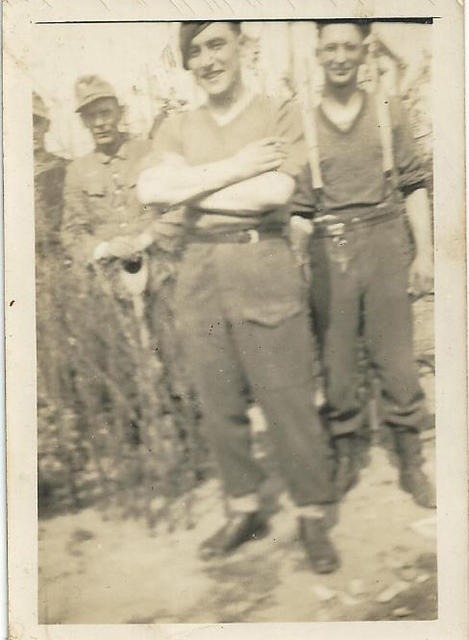 Duffy (1 Bde. Signals) and POWs in garden of flat Oldenburg 1945