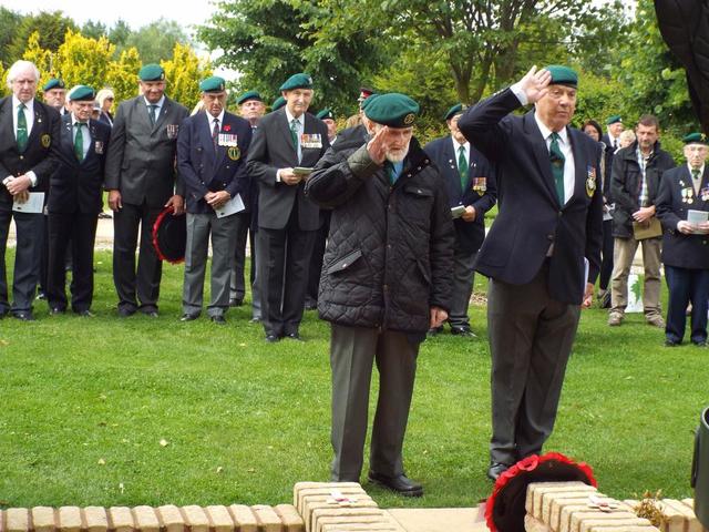 Jack and Joe laying Jacks wreath