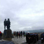 Lieutenant Colonel Peter Little OBE, OC 7 Scots, lays a wreath