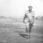 Lt Thomas Turton RNVR on one of the Bark West beaches Sicily after  Op. Husky