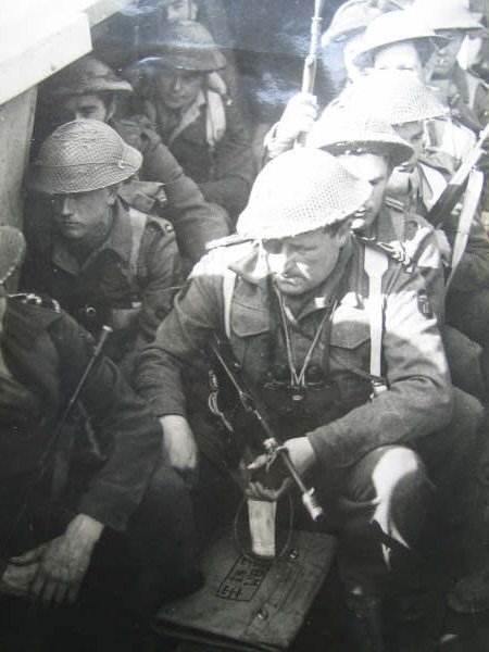 Lt Thomas Turton RNVR and others in an LCA 1943