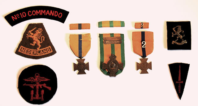 Medals of Albert Bloemink and insignia patches relating to his unit