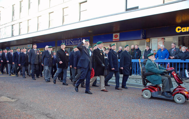 March past Joe Murtagh saluting as the Veterans march past