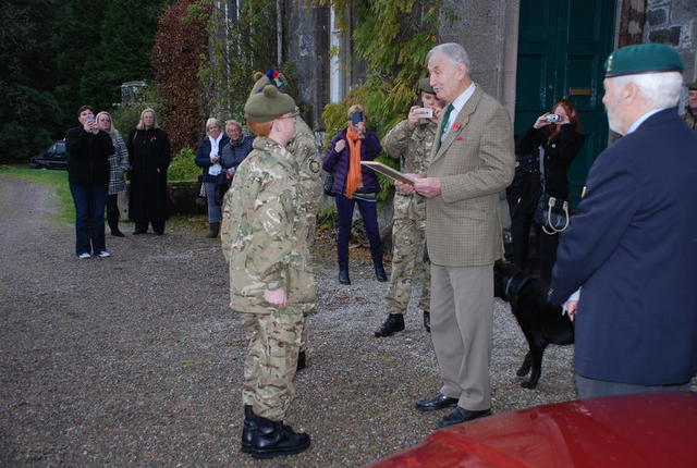 Brigadier Thomas presenting the award to the winning cadet