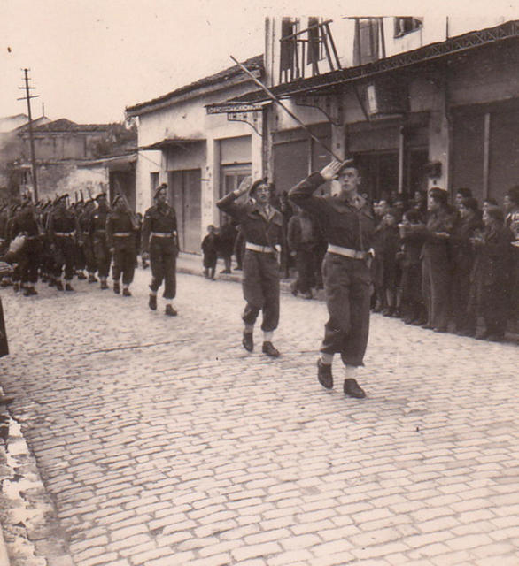 Lt. GD Bisset and Lt. DWD Peel salute as 1 Troop No 9 Commando, marches off - Drama, 12 November 1944