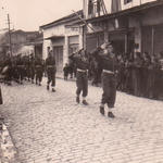 Lt. G.D. Bisset and Lt. D.W.D. Peel salute as 1 Troop No 9 Commando, marches off - Drama, 12 November 1944