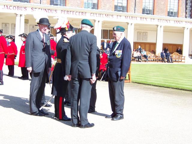 The Reviewing Officer is introduced to Jim Petrie No 6 Cdo.