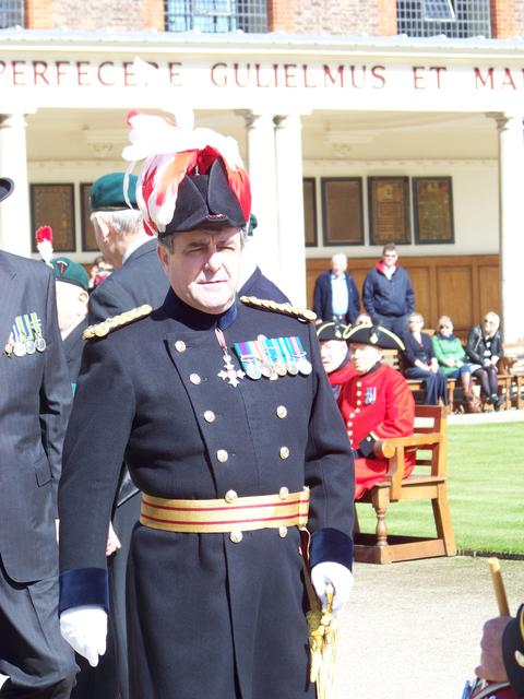 Ooops! The Major General spots someone wearing an RAF cap badge on his parade...