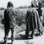 Col Peter Young briefs two snipers, Bernard Machin and Joe Leedham, in the Orne River area, 17th June 1944