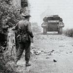 Lt Col Moulton, 48 RM Commando,directing the fire of tanks supporting the attack on Langrune strongpoint D+1, 7th June 1944