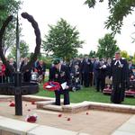 Edward Redmond, No.5 Commando, places a wreath.