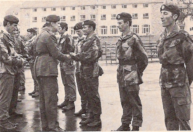 Maj Gen Sir Steuart Pringle RM presents Sgt Morgan 131 Indep Cdo Sqn RE(V) with his Green Beret, CTCRM 1978