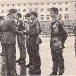 Maj Gen Sir Steuart Pringle RM presents Sgt Morgan 131 Indep Cdo Sqn RE(V) with his Green Beret, CTCRM 1978