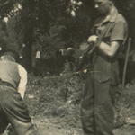 Piper Bill Millin, No  4 Cdo,, burial detail for German dead at Belsen May 1945.