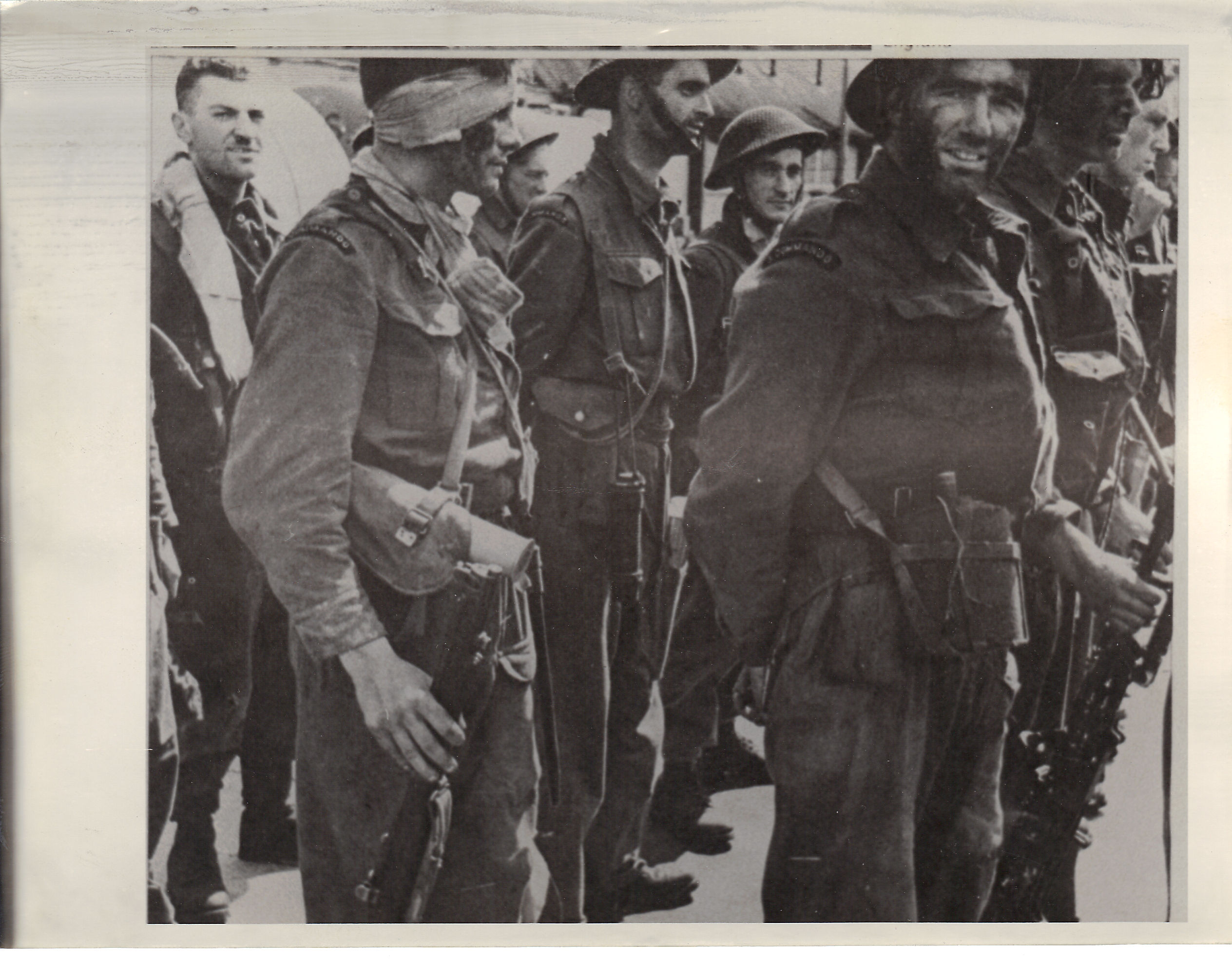 Tpr. Victor Adderton MM (No.3 Cdo) (centre rank at rear) and others after Dieppe raid