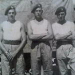 Johnny Bolch (left), L/Cpl  Fred Carrington, and Tommy Mann (right)